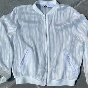 Trendy semi-sheer white bomber jacket